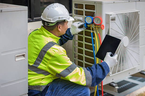 Professional Heat Pump Repair technician working in Superior, WI